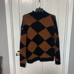 Over sized sweater black and dark orange. Size med
